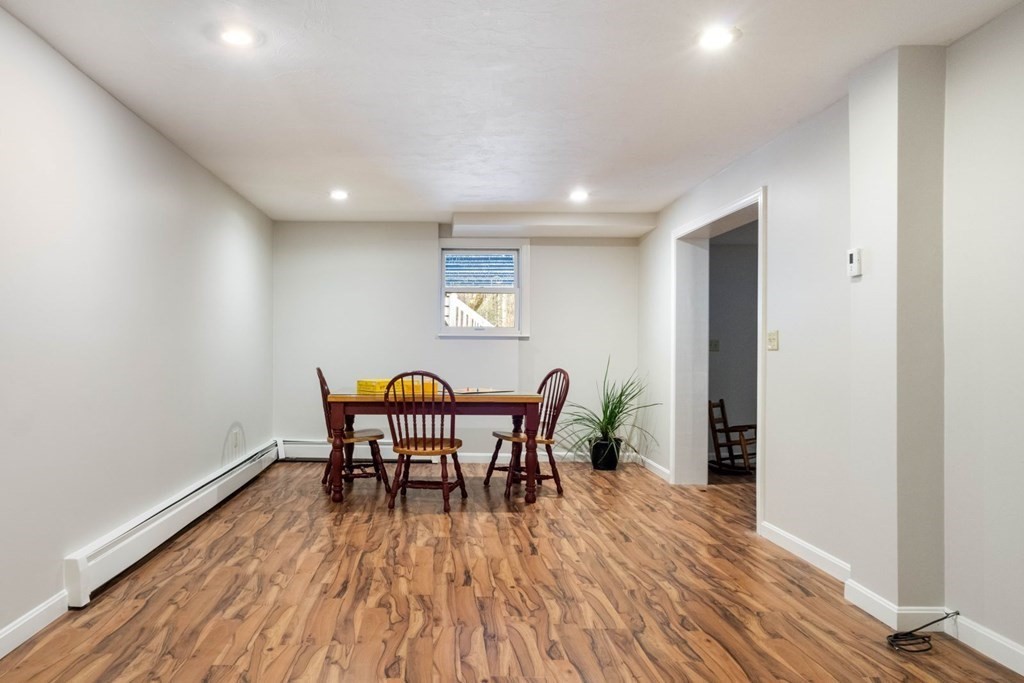 13 Jonathans Way Upton, MA 01568 - Photo 25 of 36 a view of a dining room with furniture and wooden floor