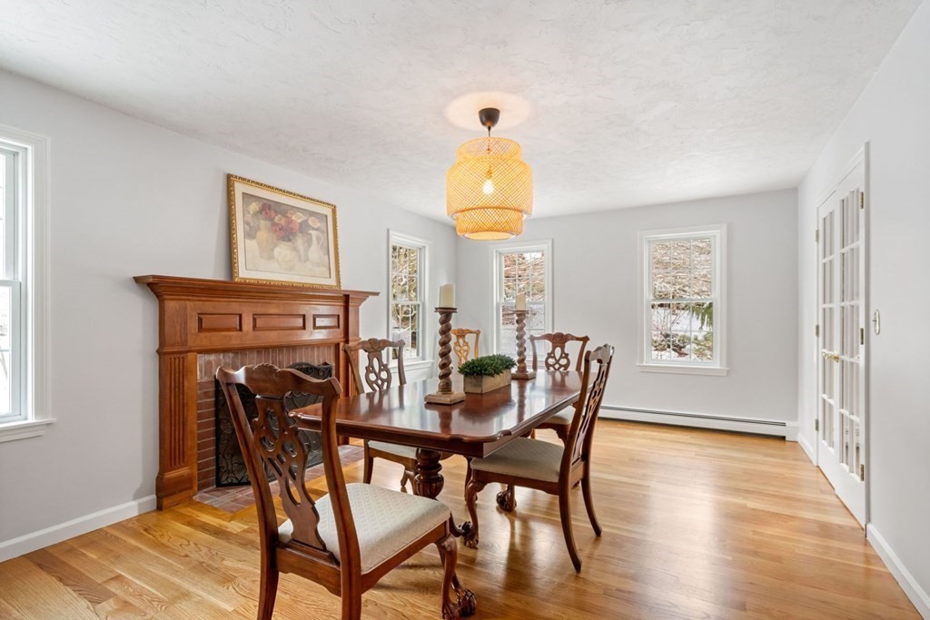 13 Jonathans Way Upton, MA 01568 - Photo 4 of 36 a view of a dining room with furniture and wooden floor