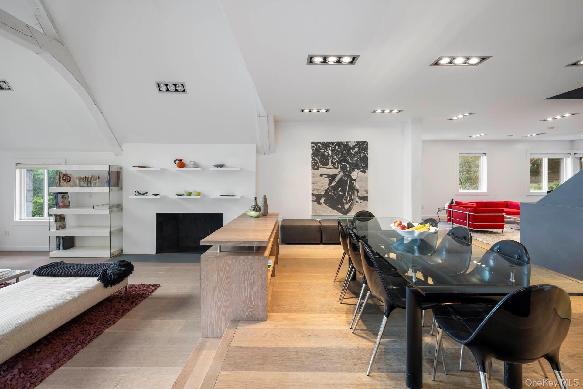 800 West 231st Street Bronx, NY 10463 - Photo 13 of 36 a living room with furniture and a fireplace