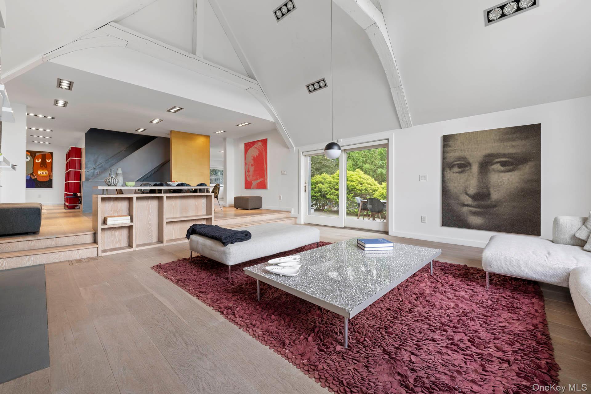 800 West 231st Street Bronx, NY 10463 - Photo 14 of 36 a living room with furniture rug and window