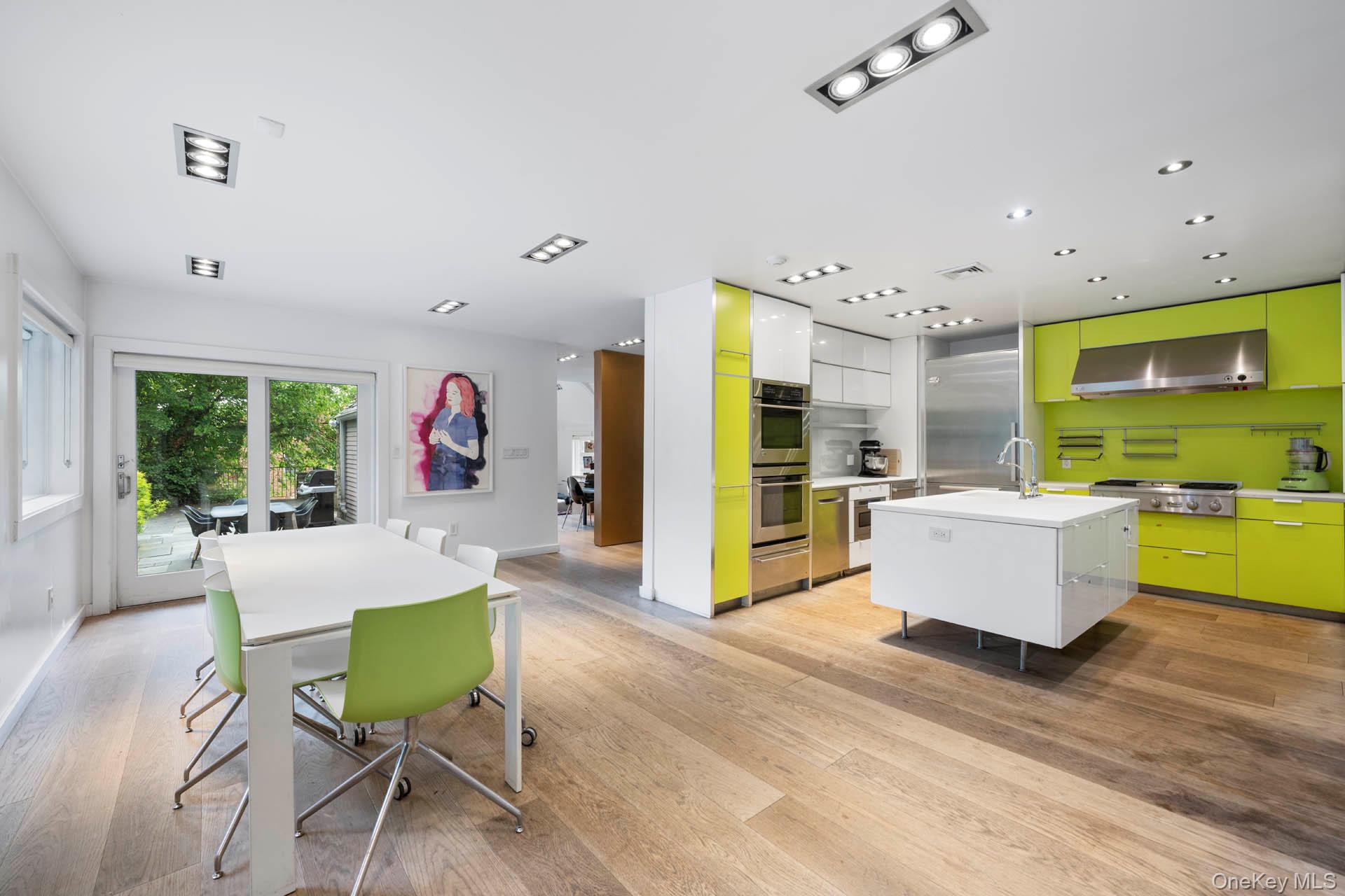800 West 231st Street Bronx, NY 10463 - Photo 16 of 36 a living room with furniture and a large window