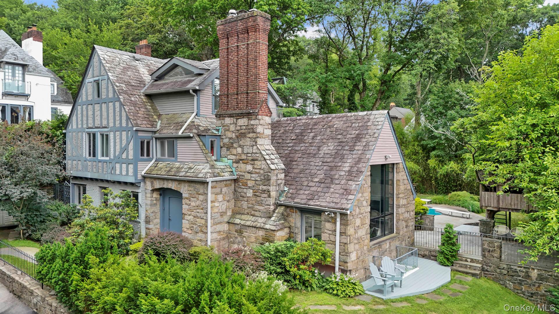 800 West 231st Street Bronx, NY 10463 - Photo 2 of 36 a aerial view of a house with a yard and balcony