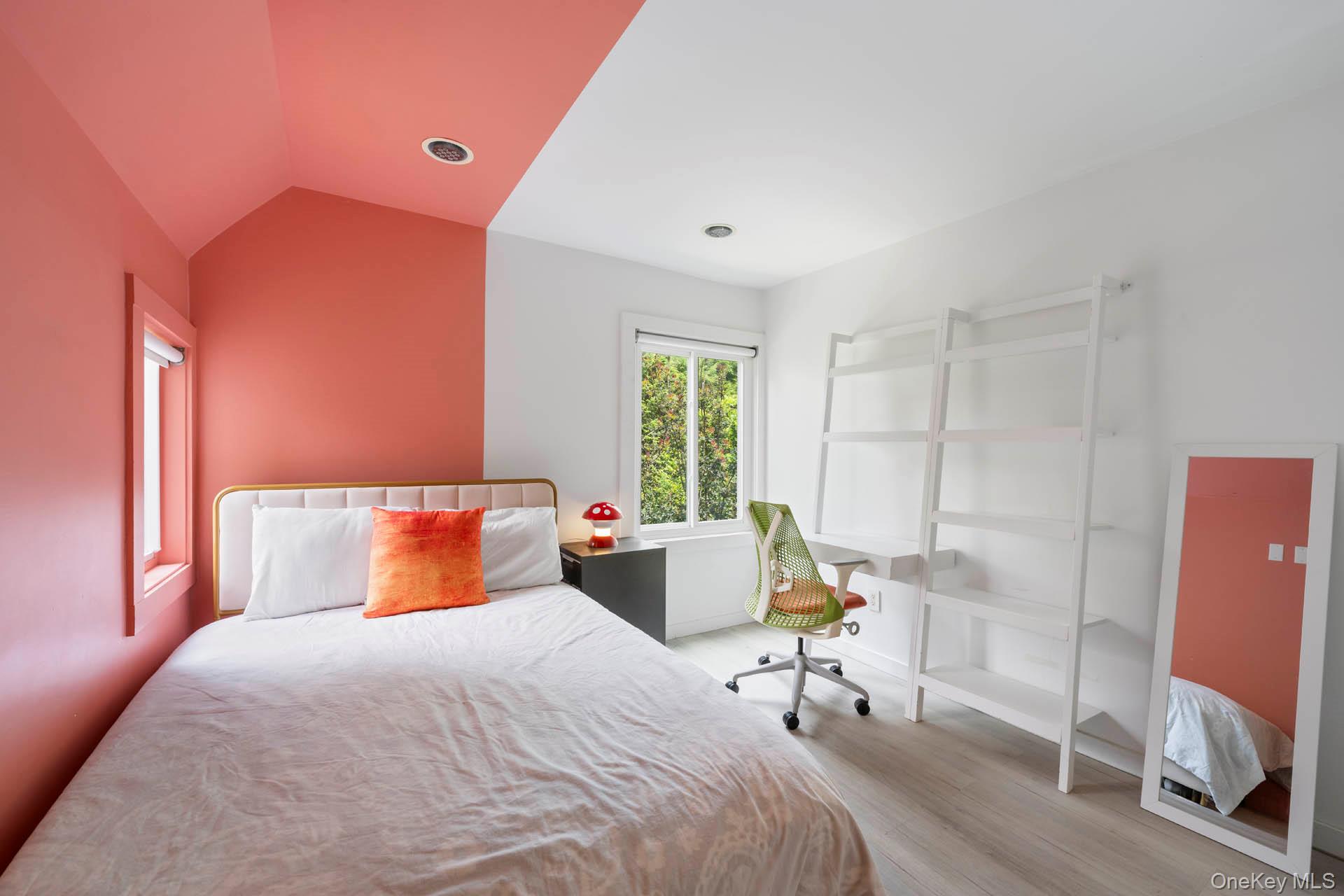 800 West 231st Street Bronx, NY 10463 - Photo 21 of 36 a bedroom with a bed and a window