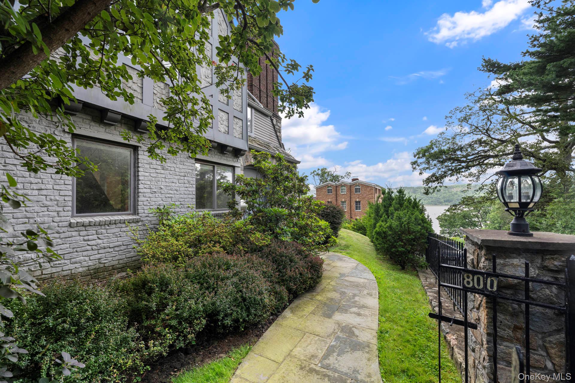 800 West 231st Street Bronx, NY 10463 - Photo 3 of 36 a view of a pathway with a house
