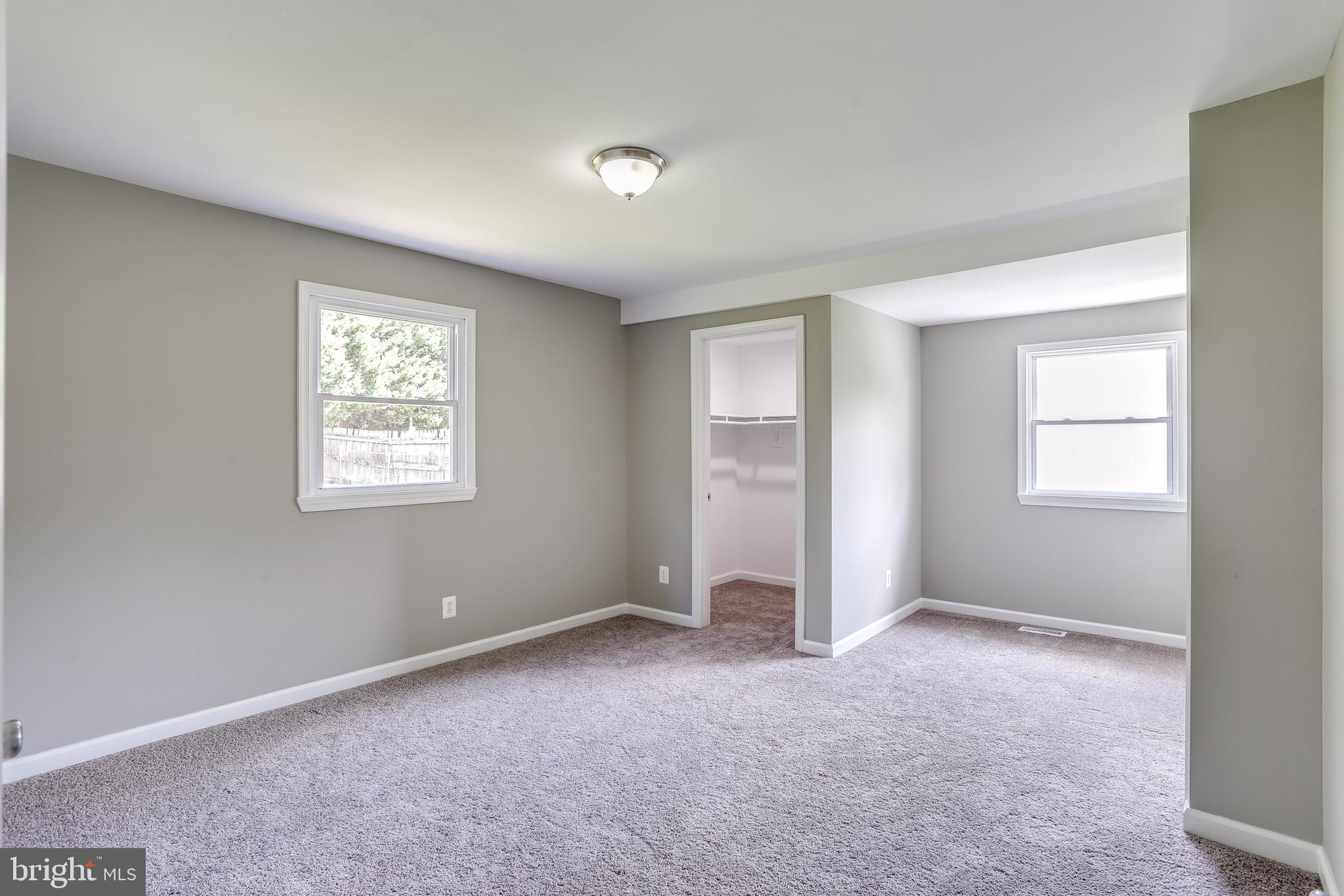 7106 Munford Road Baltimore, MD 21244 - Photo 12 of 31 an empty room with windows