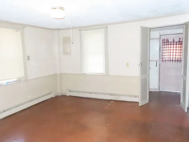 an empty room with a window