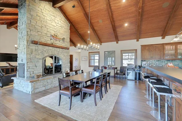 a kitchen with granite countertop a sink and cabinets