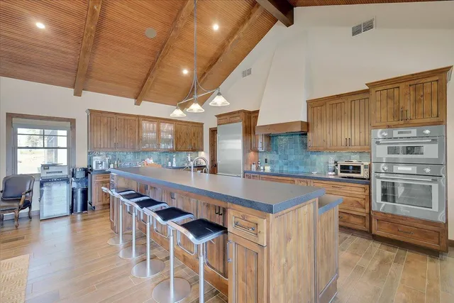 a white toilet sitting next to a shower