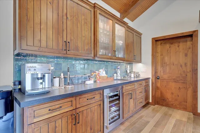 a living room with fireplace furniture and a flat screen tv