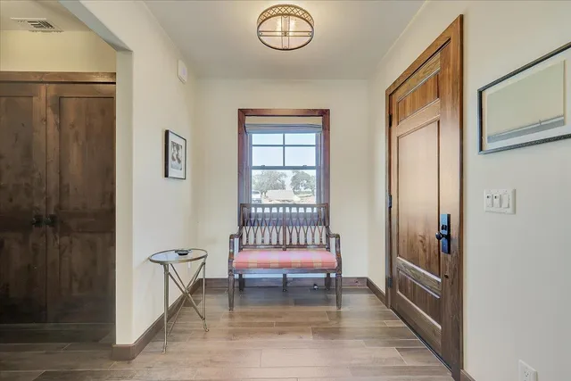 a spacious bathroom with a toilet sink and shower