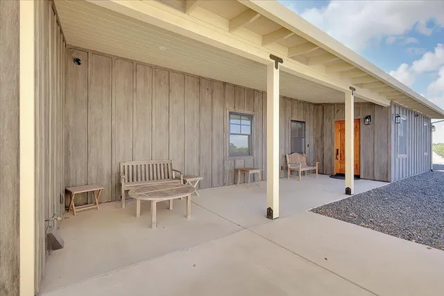 a view of house with a yard