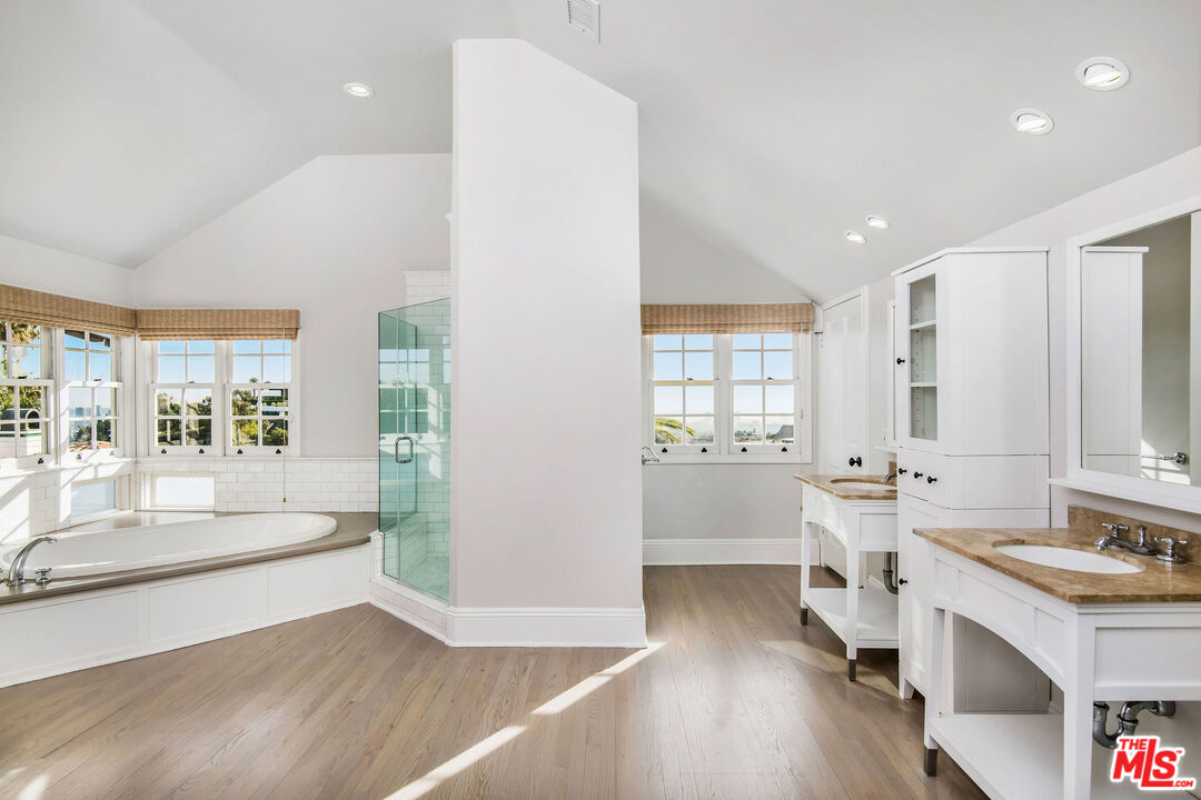1110 Stradella Road Los Angeles, CA 90077 - Photo 13 of 26 a large room with a large window and furniture
