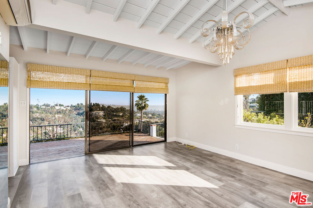 1110 Stradella Road Los Angeles, CA 90077 - Photo 17 of 26 a view of a room with a large window