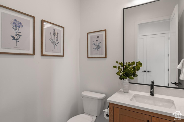 5367 Cyan Lane St. George, UT 84790 - Photo 10 of 36 Half bath featuring vanity and toilet