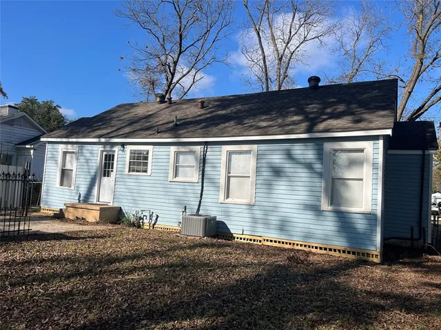 a backyard of a house with seating space
