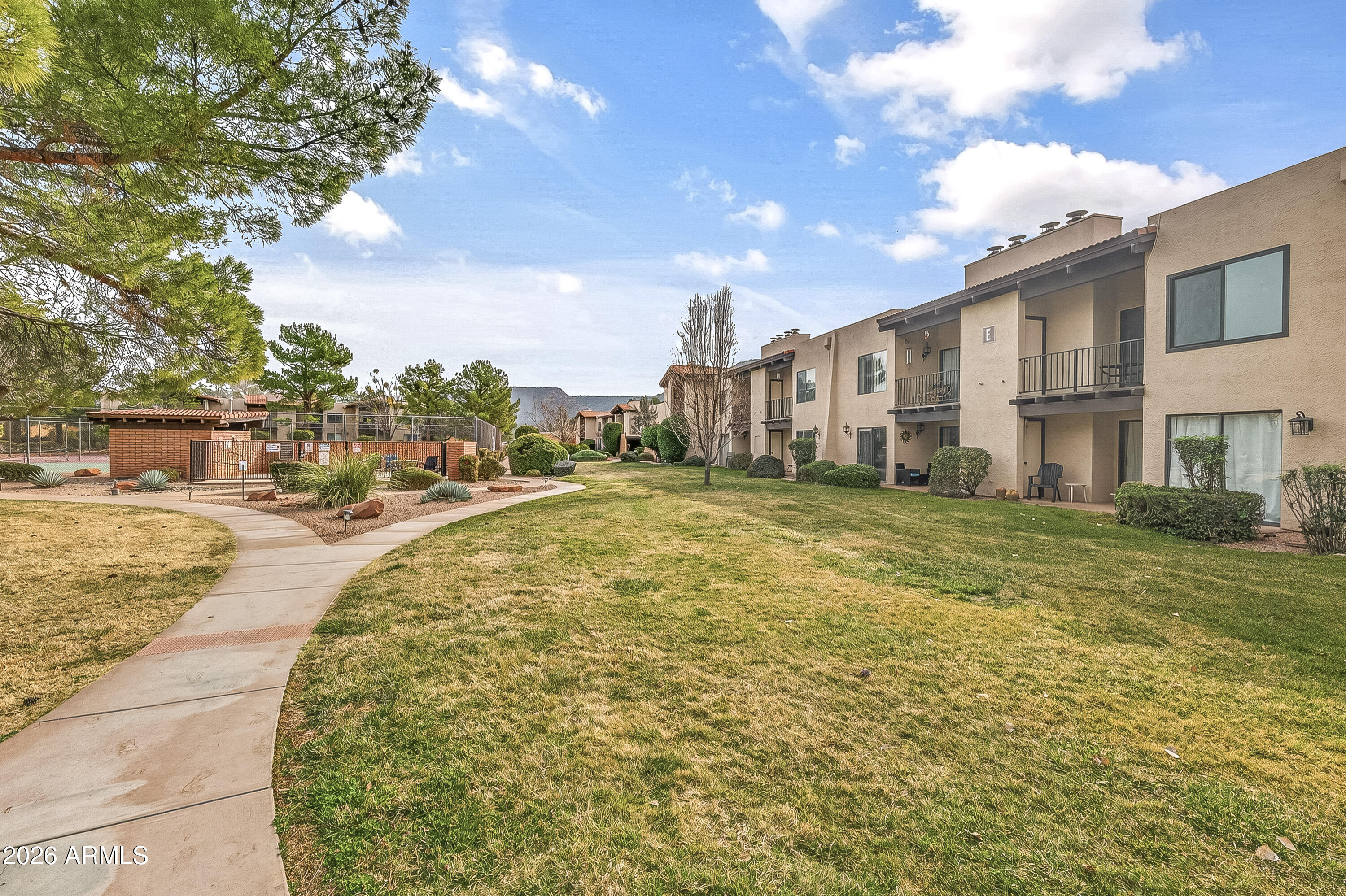 65 Verde Valley School Road, Unit E3 Sedona, AZ 86351 - Photo 15 of 24 a view of a city with tall buildings
