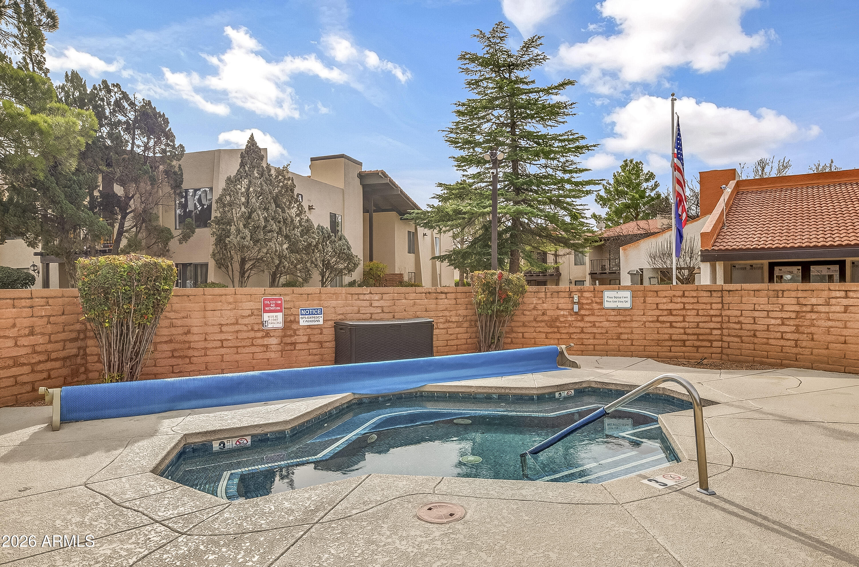 65 Verde Valley School Road, Unit E3 Sedona, AZ 86351 - Photo 17 of 24 a view of swimming pool with a lounge chairs