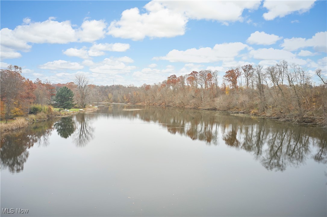 2671 Spring Valley Boulevard Mogadore, OH 44260 - Photo 6 of 23 Water view featuring a forest