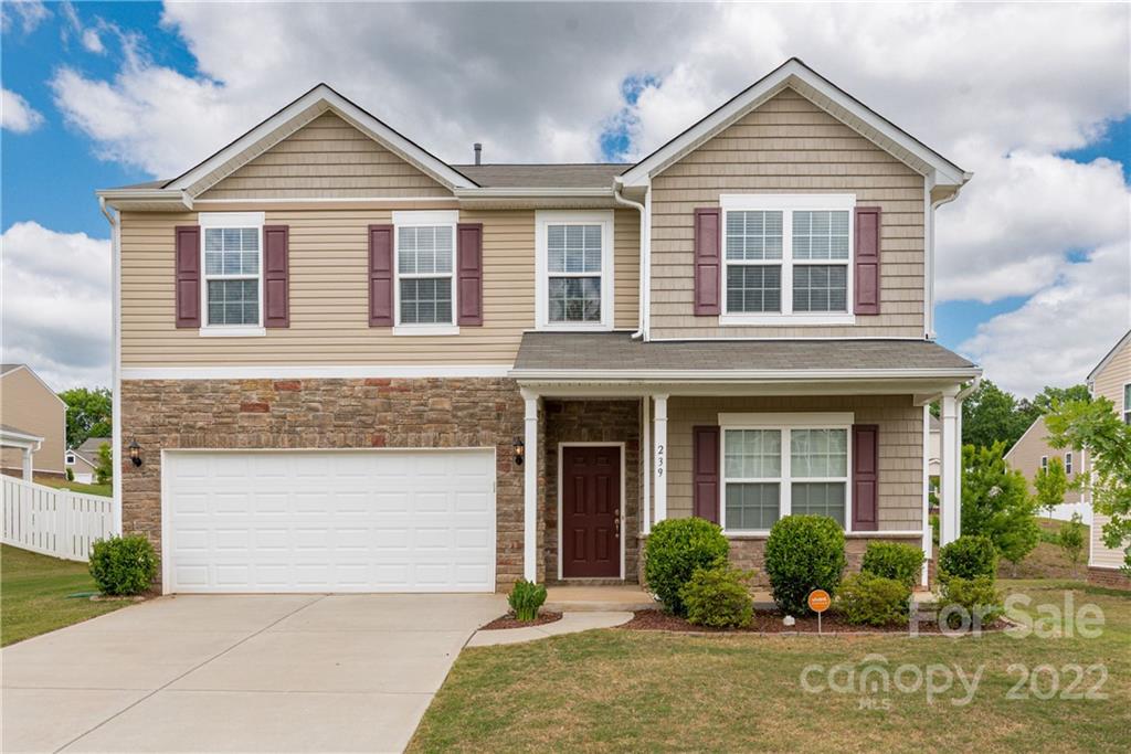 239 Keating Pl Drive Fort Mill, SC 29708 - Photo 1 of 33 a front view of a house with garden