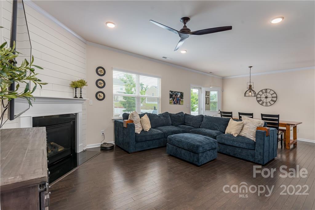 239 Keating Pl Drive Fort Mill, SC 29708 - Photo 13 of 33 a living room with furniture and a fireplace