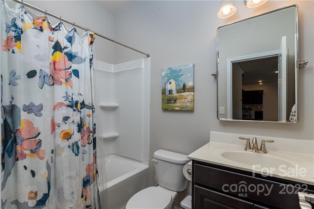 239 Keating Pl Drive Fort Mill, SC 29708 - Photo 17 of 33 a bathroom with a sink mirror vanity and toilet