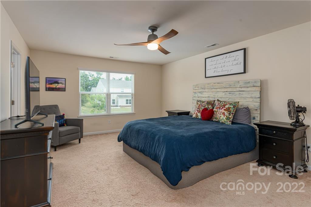 239 Keating Pl Drive Fort Mill, SC 29708 - Photo 20 of 33 a bed room with a bed and a window