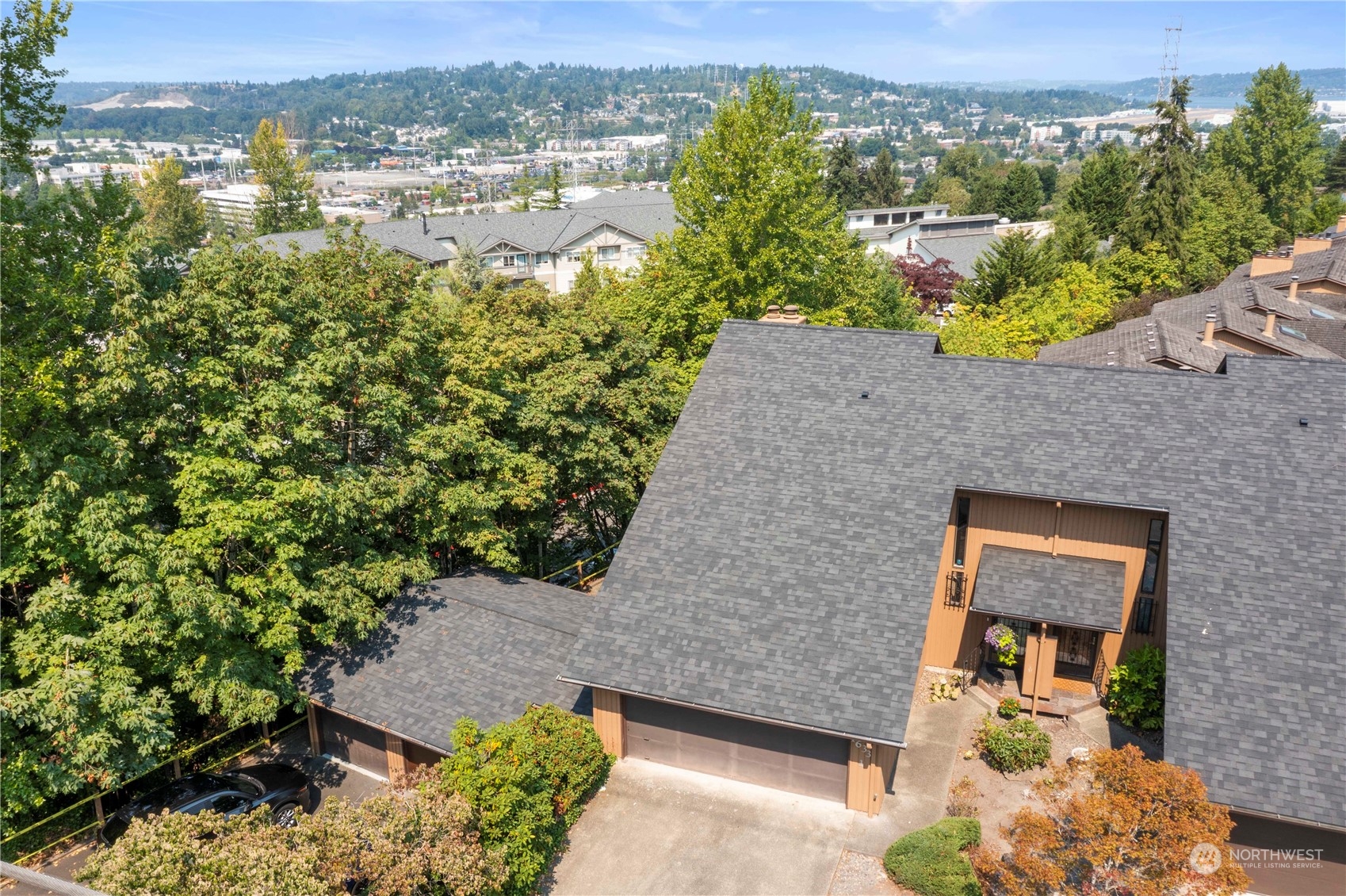 1633 Eagle Ridge Drive South, Unit A1 Renton, WA 98055 - Photo 32 of 35 an aerial view of a house with a yard lake view and mountain view
