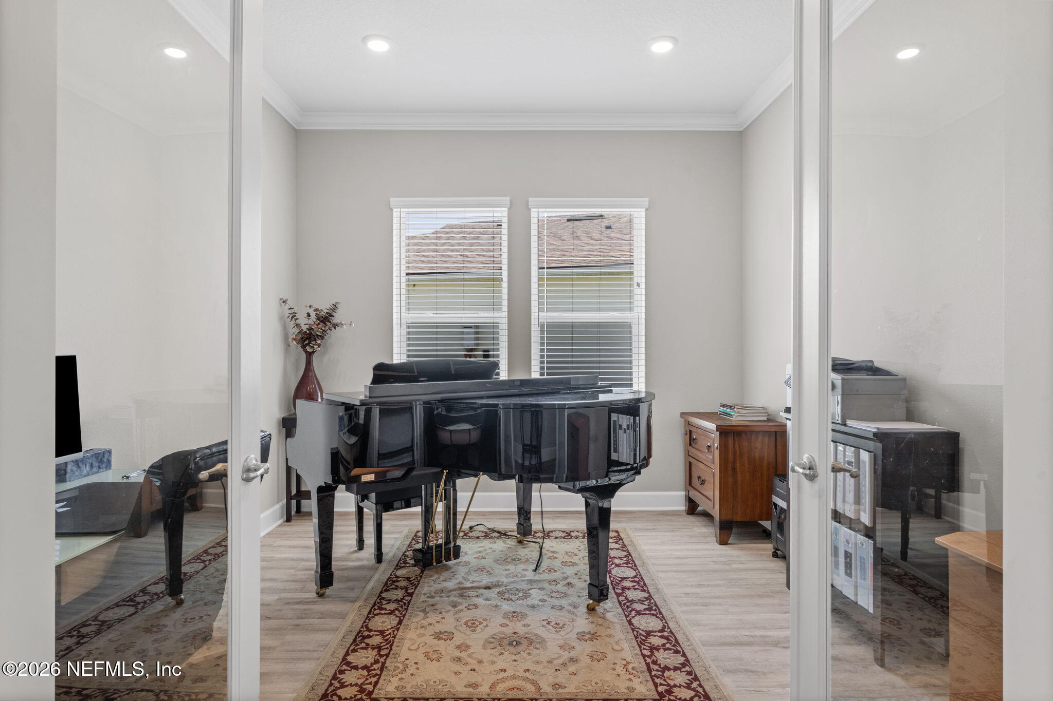 813 Rustic Mill Dr Street St. Augustine, FL 32092 - Photo 11 of 57 a workspace with furniture and a rug