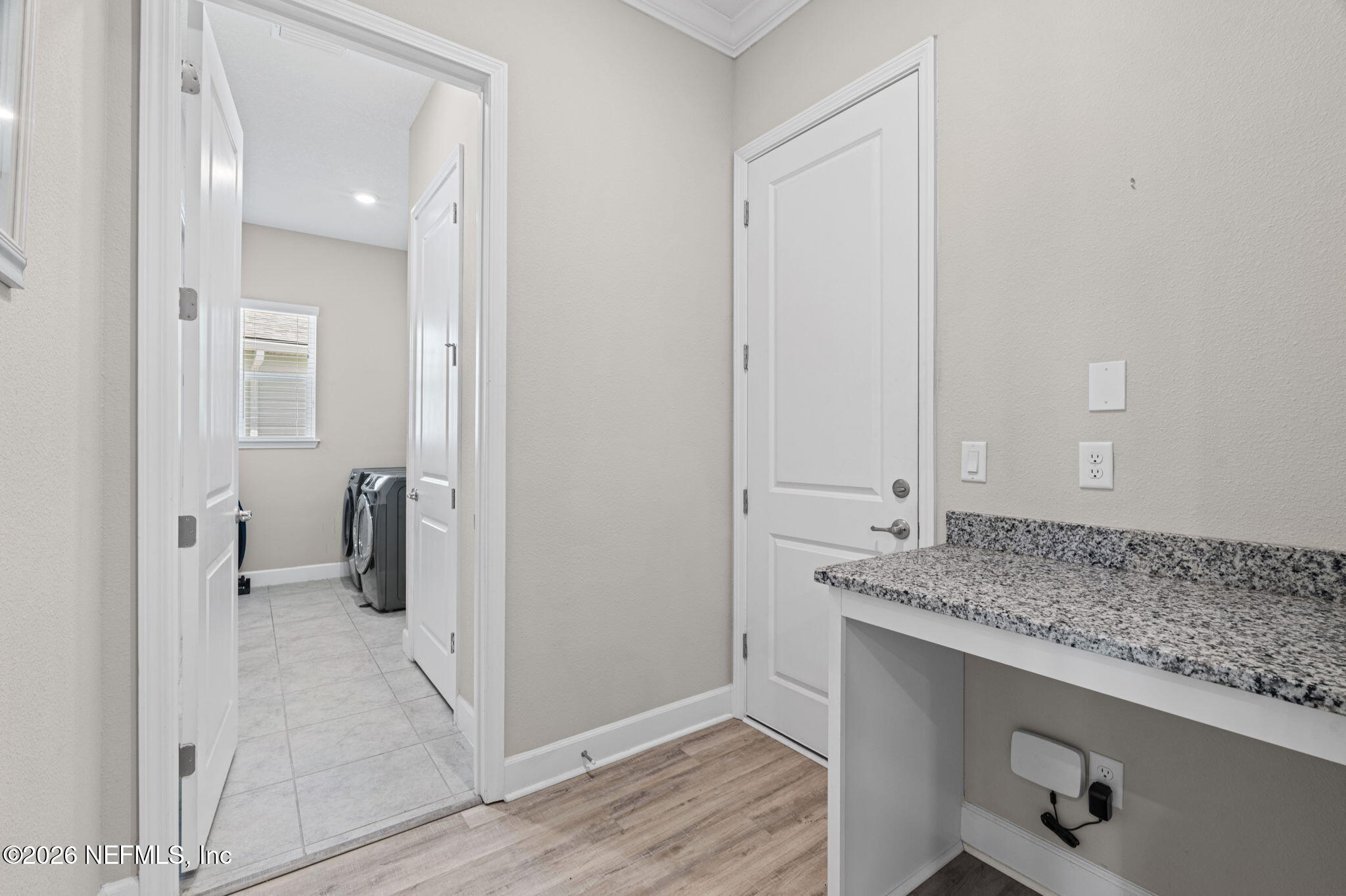 813 Rustic Mill Dr Street St. Augustine, FL 32092 - Photo 12 of 57 a en suite bathroom with a granite countertop sink and a mirror