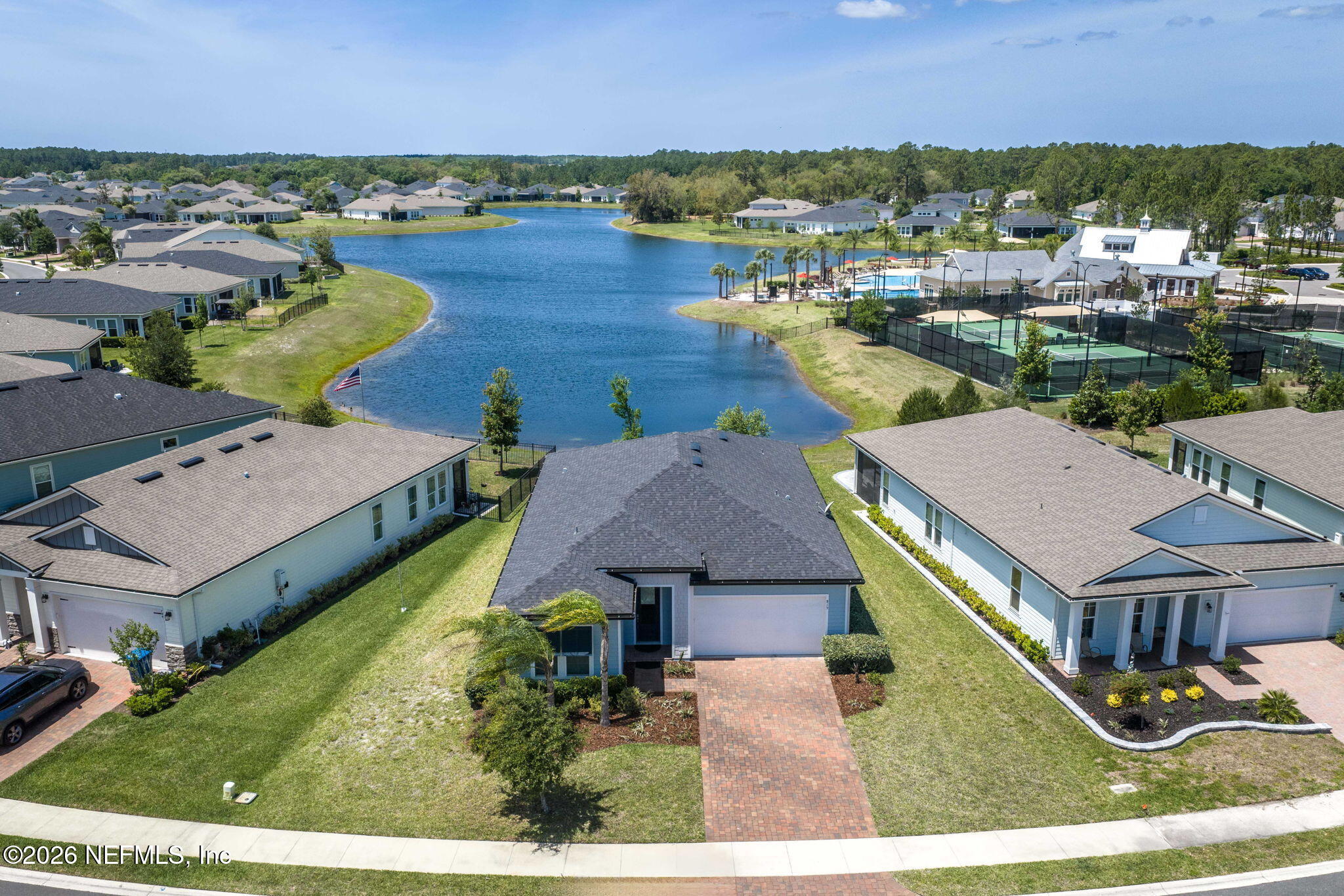 813 Rustic Mill Dr Street St. Augustine, FL 32092 - Photo 2 of 57 an aerial view of a house with garden space and lake view
