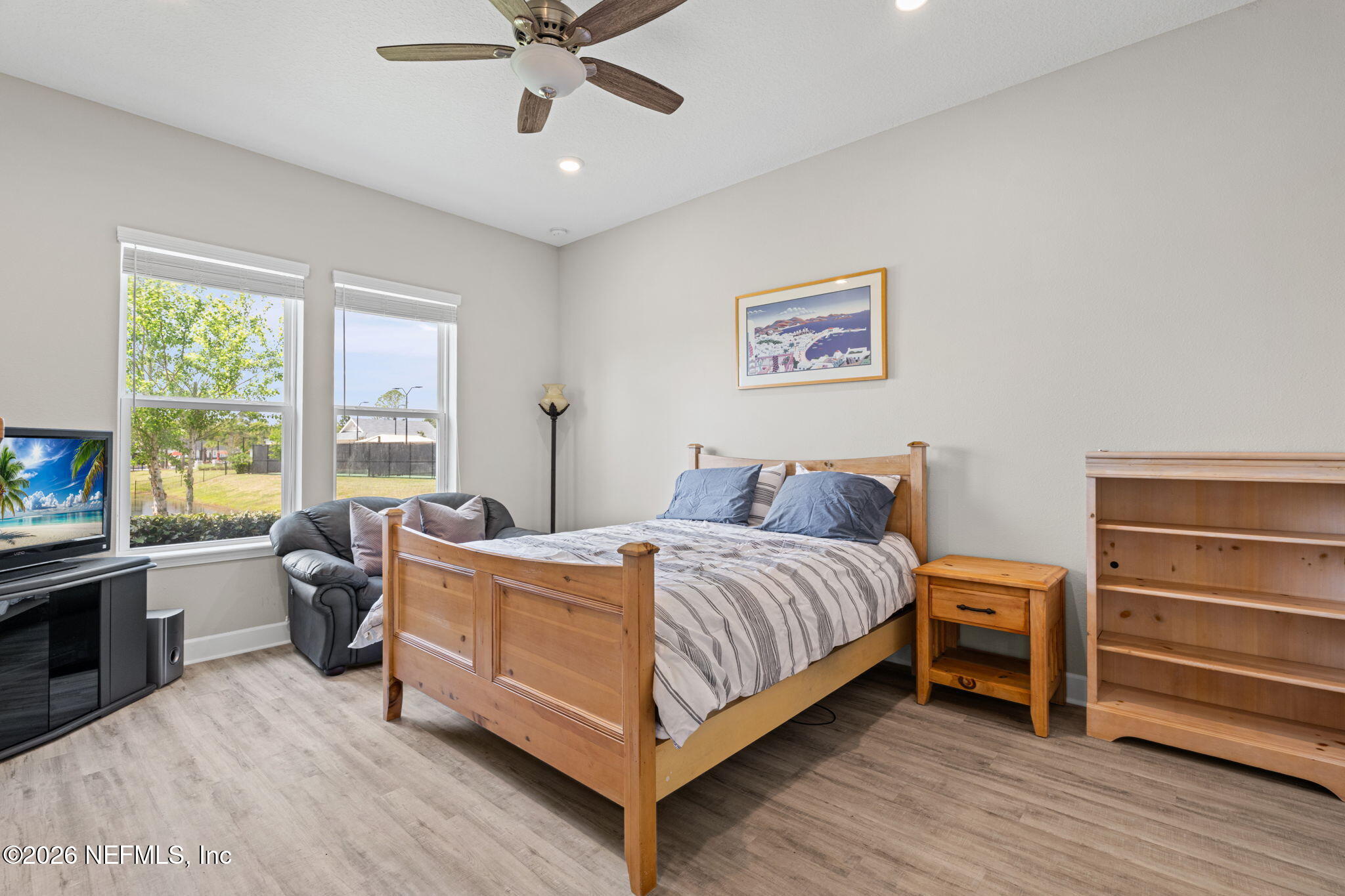813 Rustic Mill Dr Street St. Augustine, FL 32092 - Photo 22 of 57 a bedroom with a bed and a table