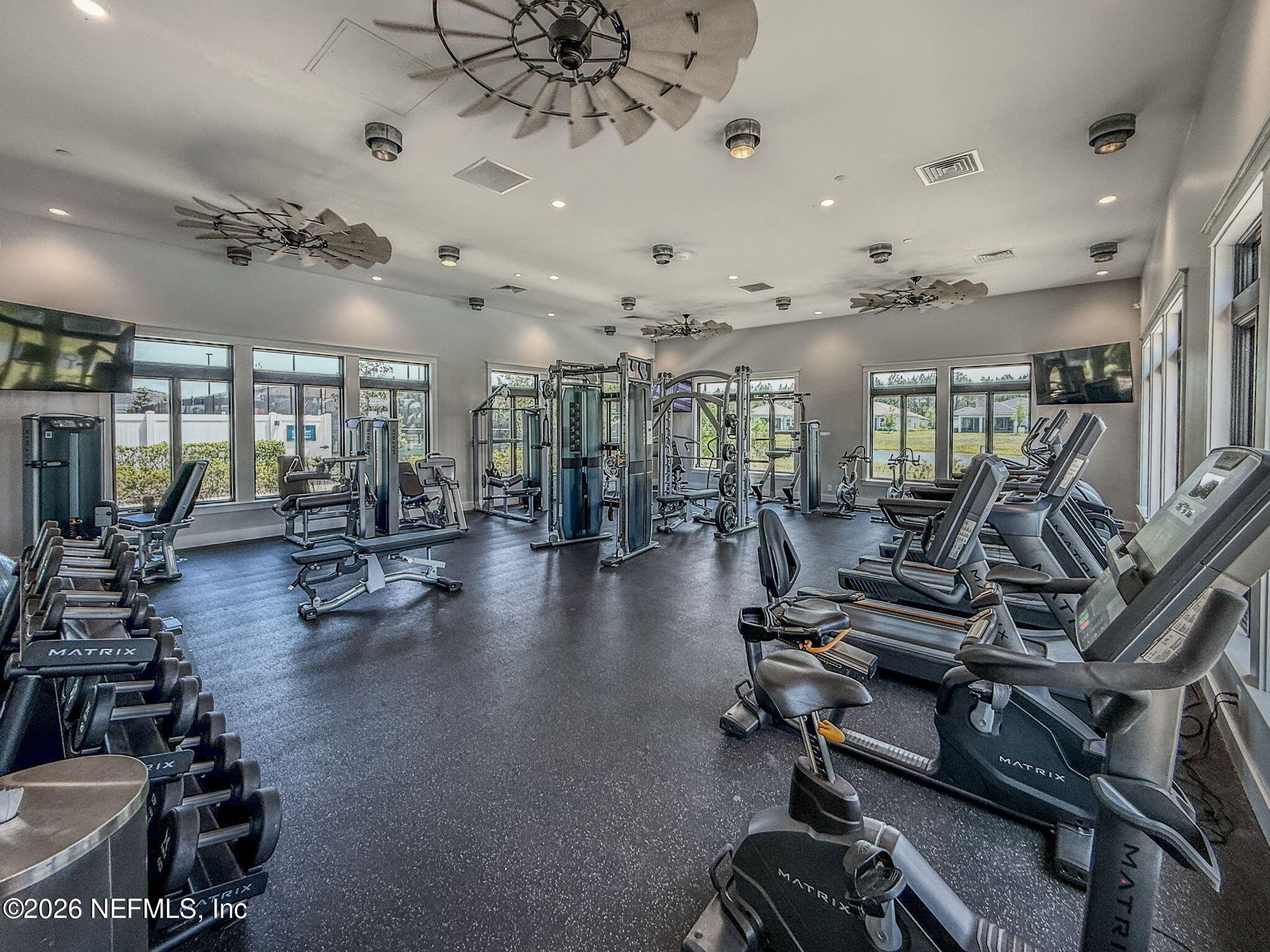 813 Rustic Mill Dr Street St. Augustine, FL 32092 - Photo 46 of 57 a view of a room with gym equipment