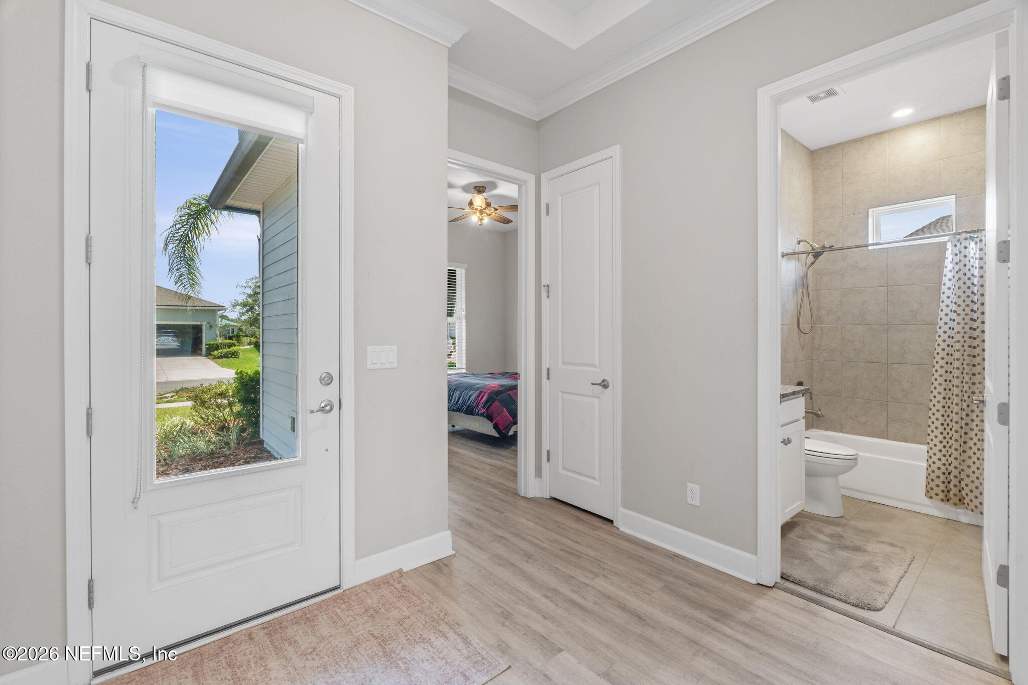 813 Rustic Mill Dr Street St. Augustine, FL 32092 - Photo 7 of 57 a bathroom with a glass shower door and a toilet