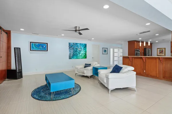 a view of livingroom with furniture and windows