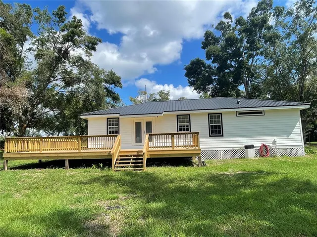 a house view with a garden space