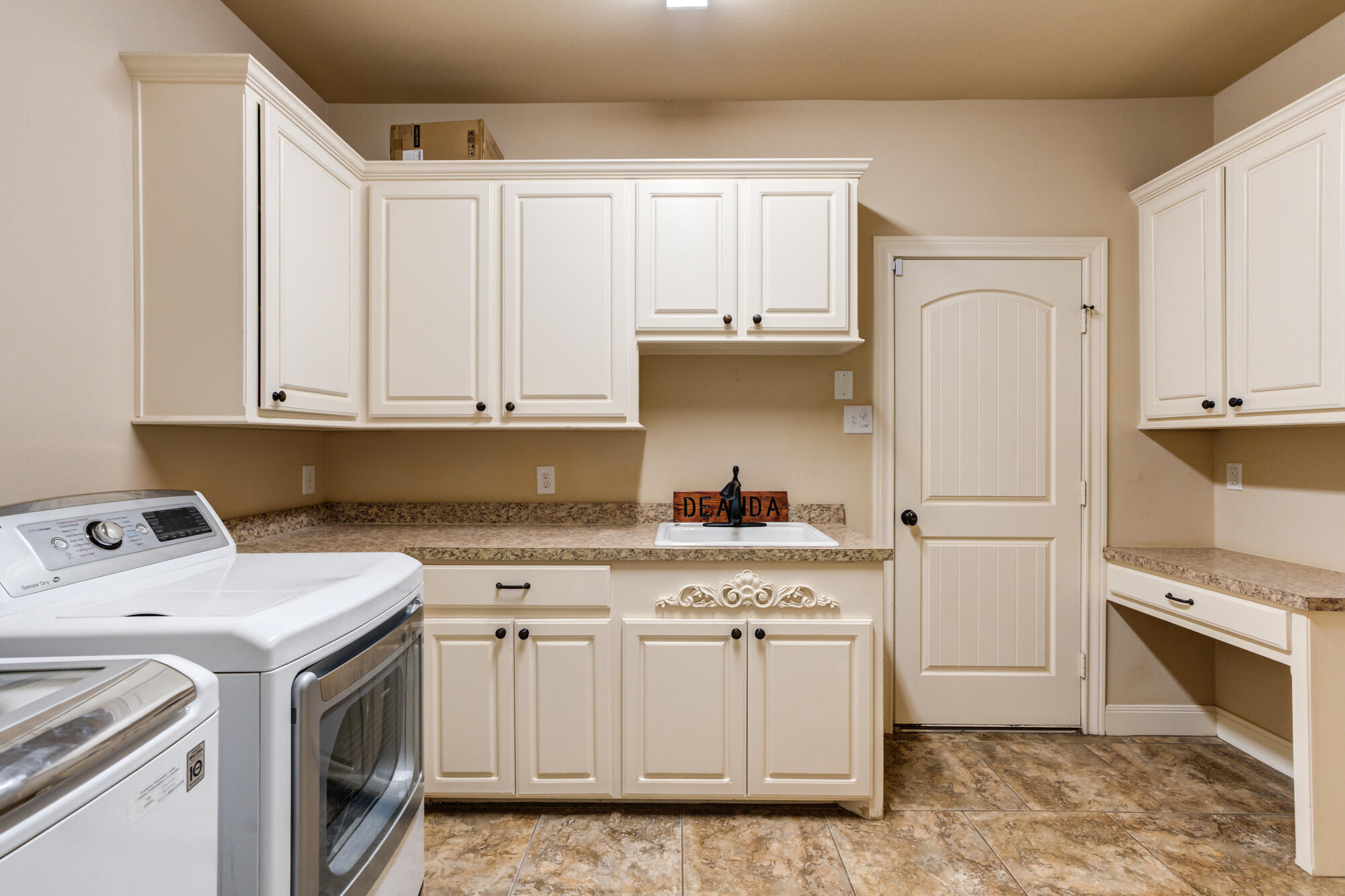 6309 76th Street Lubbock, TX 79424 - Photo 49 of 61 6309-76th-St_Lubbock-TX_43_Laundry-Room