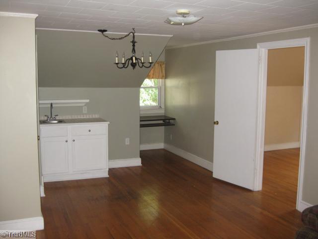 150 Cook Street Rural Hall, NC 27045 - Photo 7 of 15 Bonus. Very large Bonus room with wet bar, and real hardwoods.
