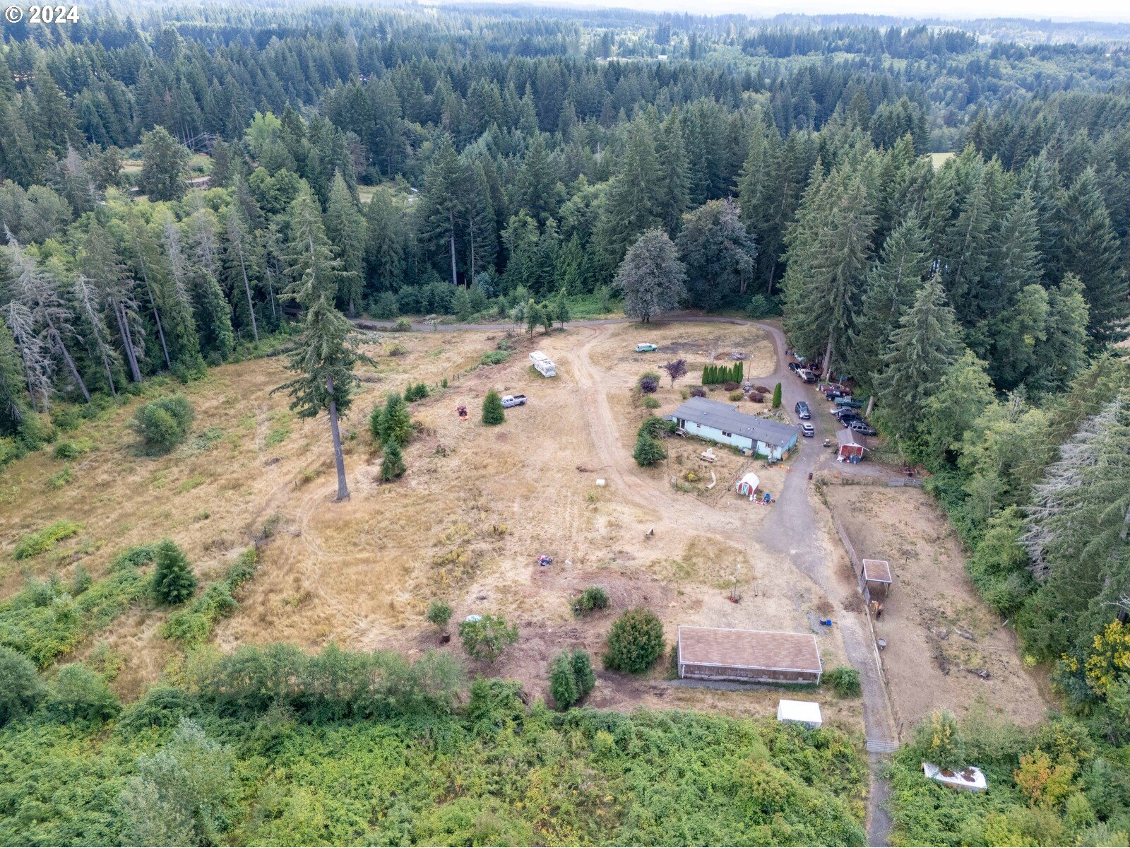 an aerial view of residential house with outdoor space