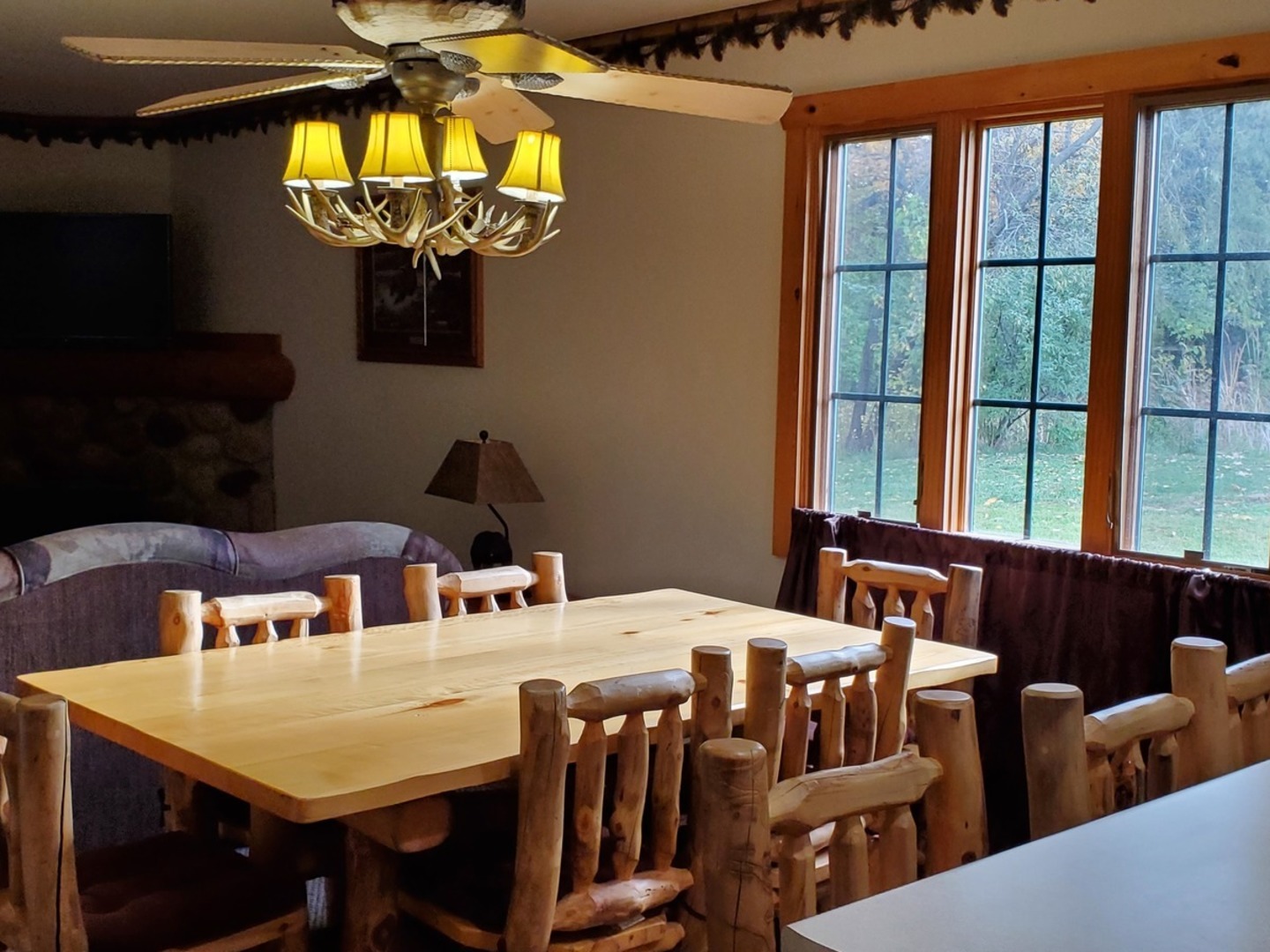 2643 North Illinois Rt 178 Road, Unit I4 Utica, IL 61373 - Photo 13 of 23 a dining room with furniture a chandelier and window
