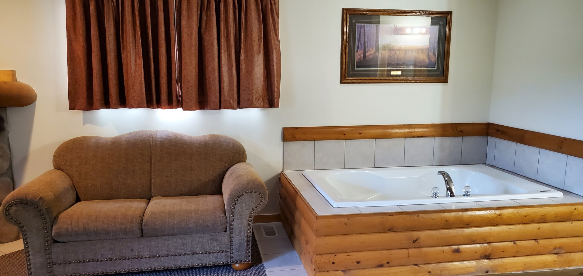 2643 North Illinois Rt 178 Road, Unit I4 Utica, IL 61373 - Photo 17 of 21 a bathroom with a tub and a couch