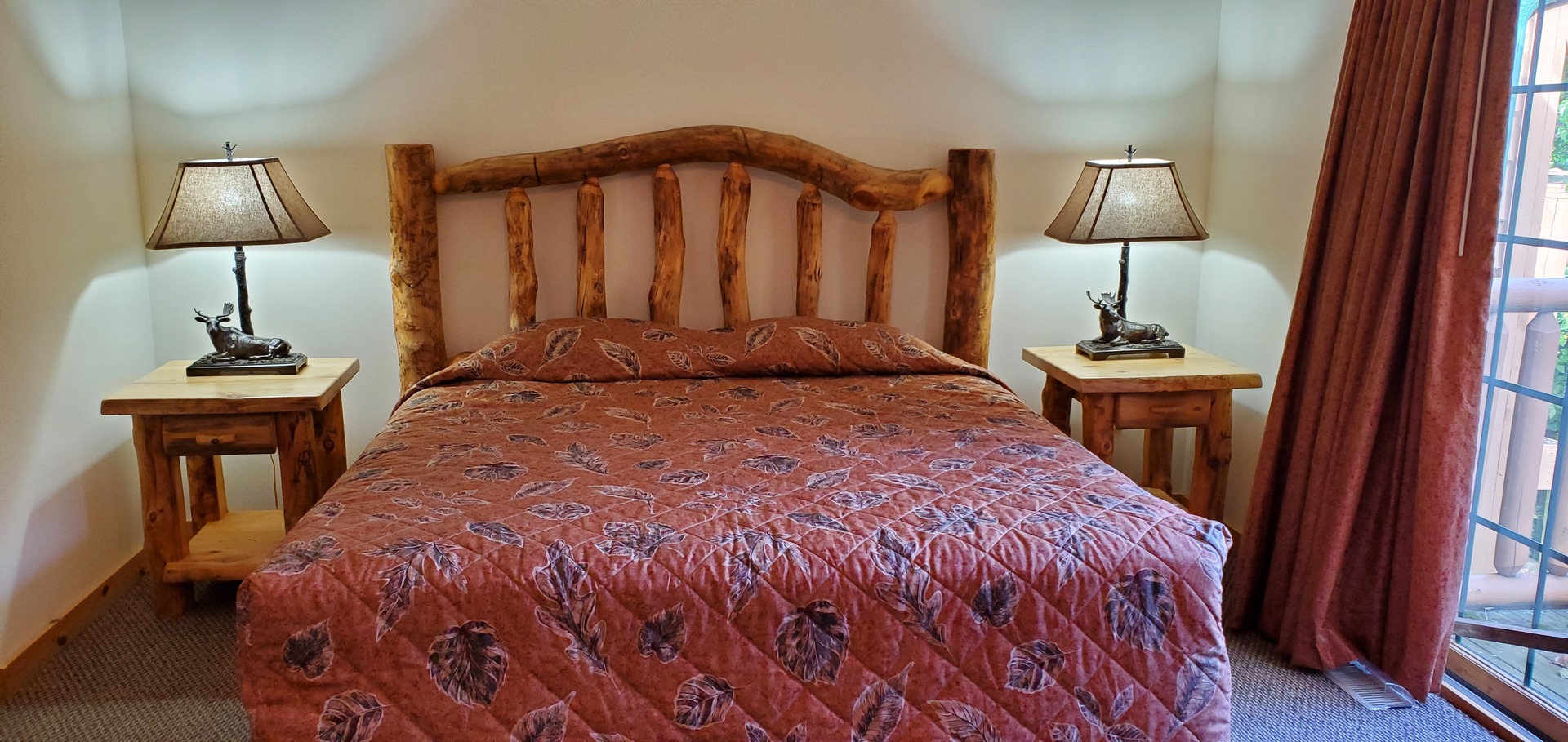 2643 North Illinois Rt 178 Road, Unit I4 Utica, IL 61373 - Photo 18 of 21 a bed sitting in a bedroom next to a lamp