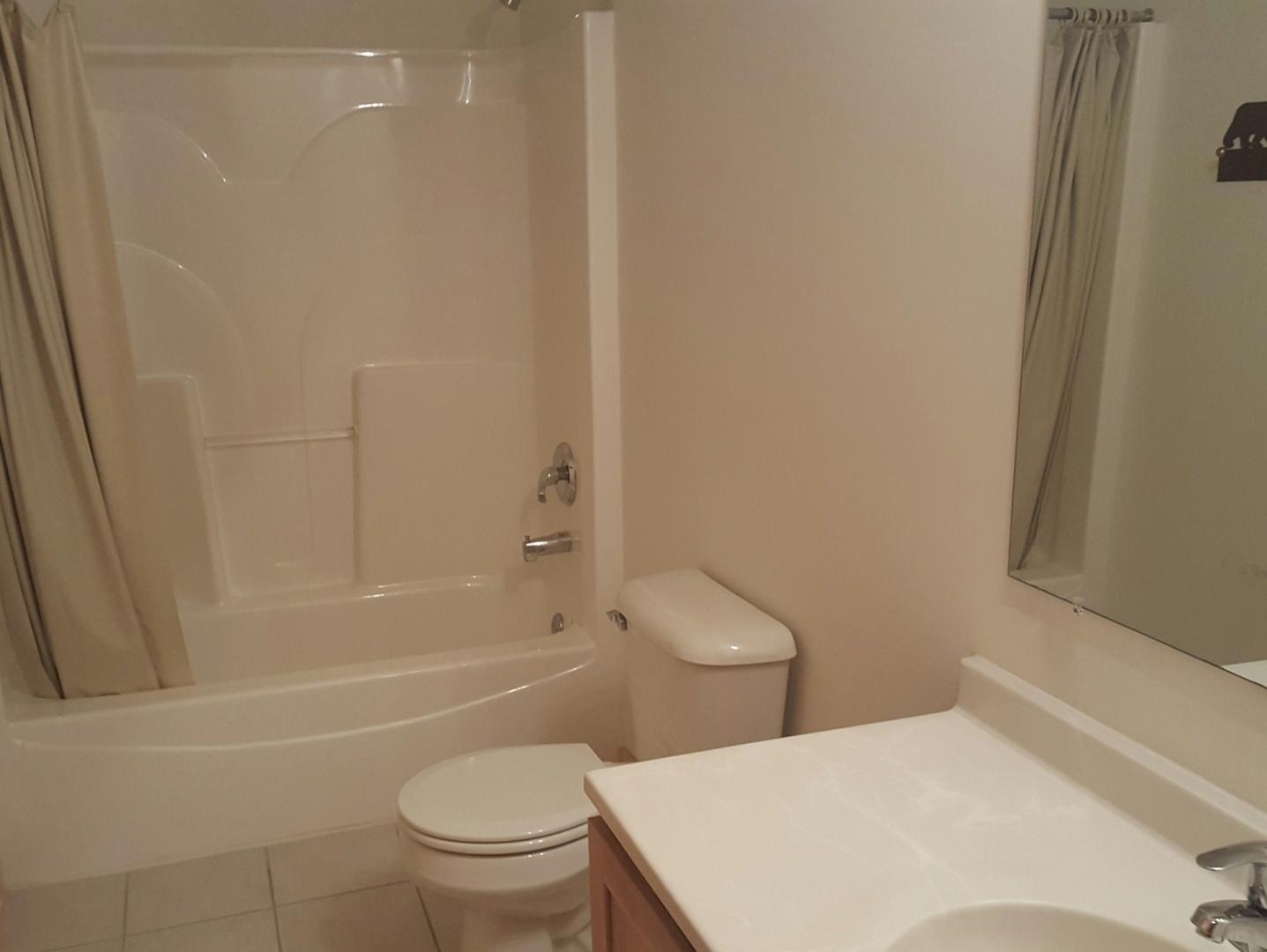 2643 North Illinois Rt 178 Road, Unit I4 Utica, IL 61373 - Photo 20 of 23 a white toilet sitting next to a bath tub
