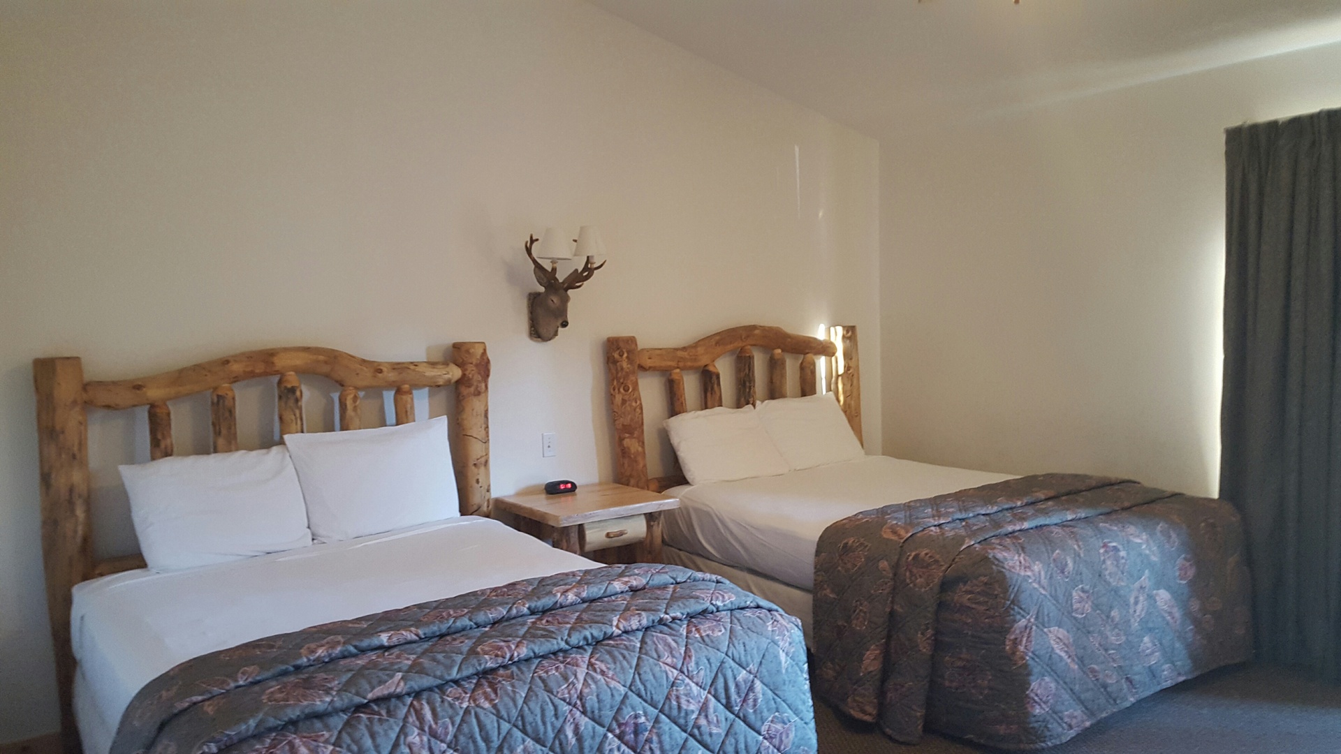 2643 North Illinois Rt 178 Road, Unit I4 Utica, IL 61373 - Photo 2 of 21 a bedroom with two beds and a table