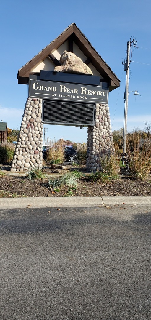 2643 North Illinois Rt 178 Road, Unit I4 Utica, IL 61373 - Photo 21 of 21 a front view of a house with a garden