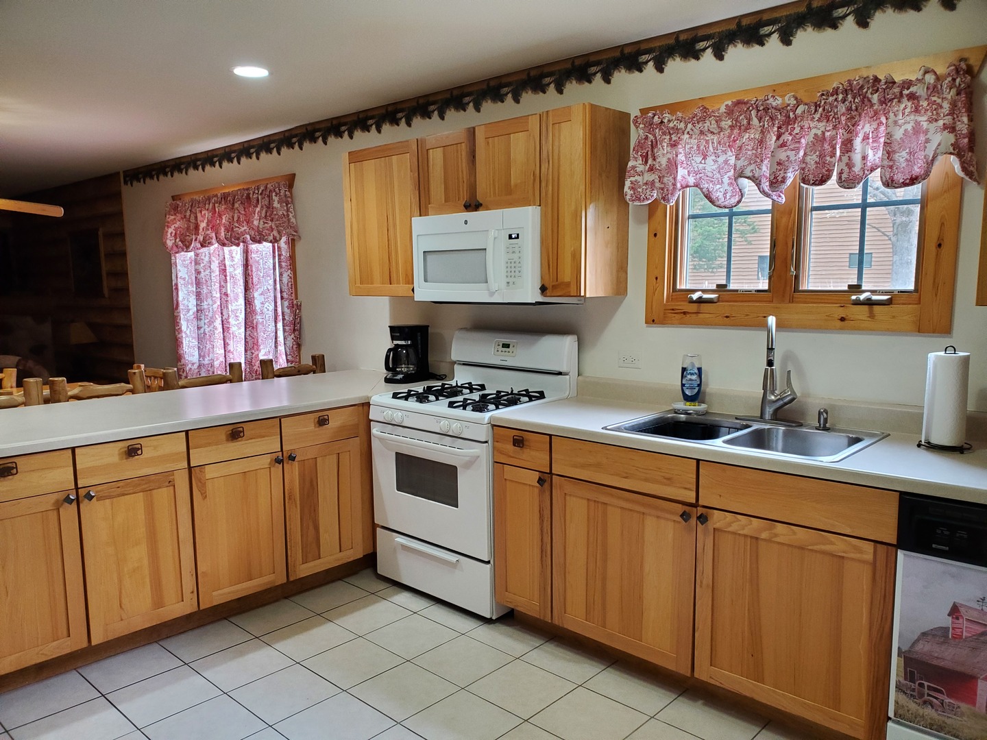 2643 North Illinois Rt 178 Road, Unit I4 Utica, IL 61373 - Photo 22 of 23 a kitchen with stainless steel appliances a stove sink and cabinets