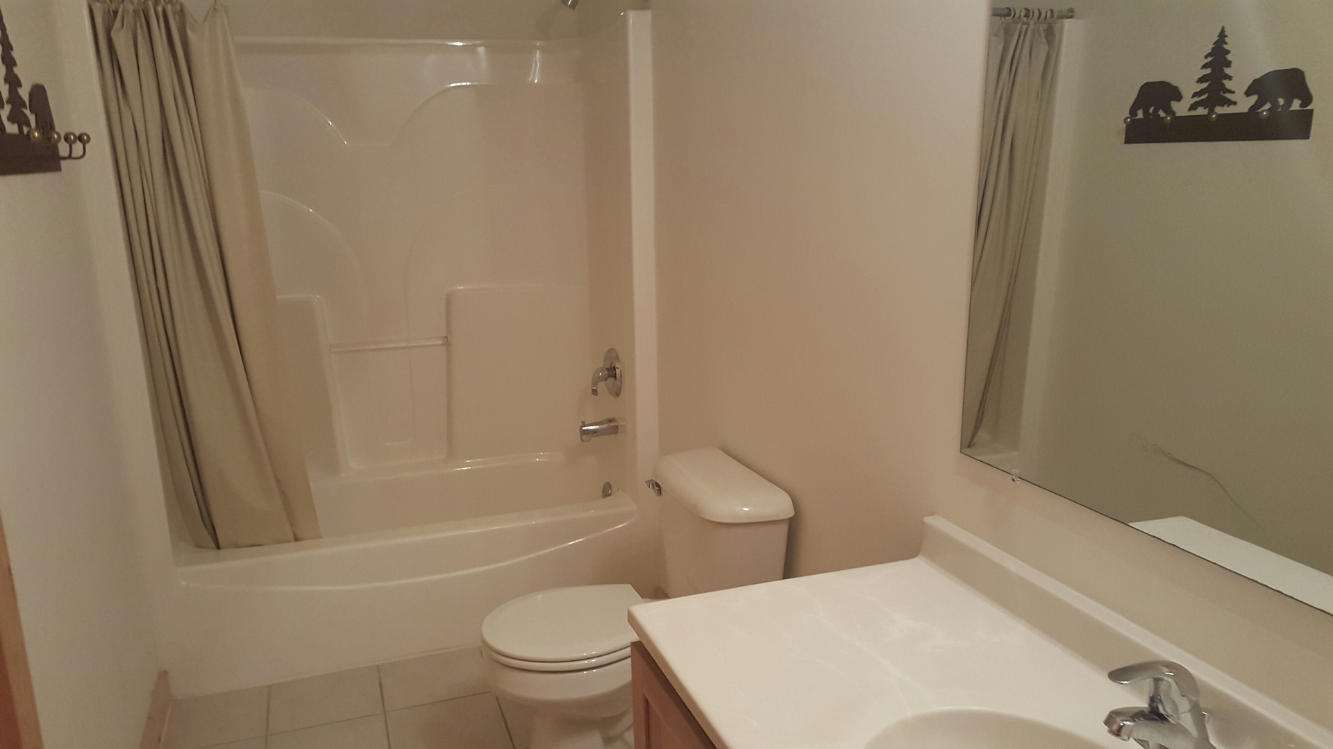 2643 North Illinois Rt 178 Road, Unit I4 Utica, IL 61373 - Photo 4 of 21 a white toilet sitting next to a bath tub