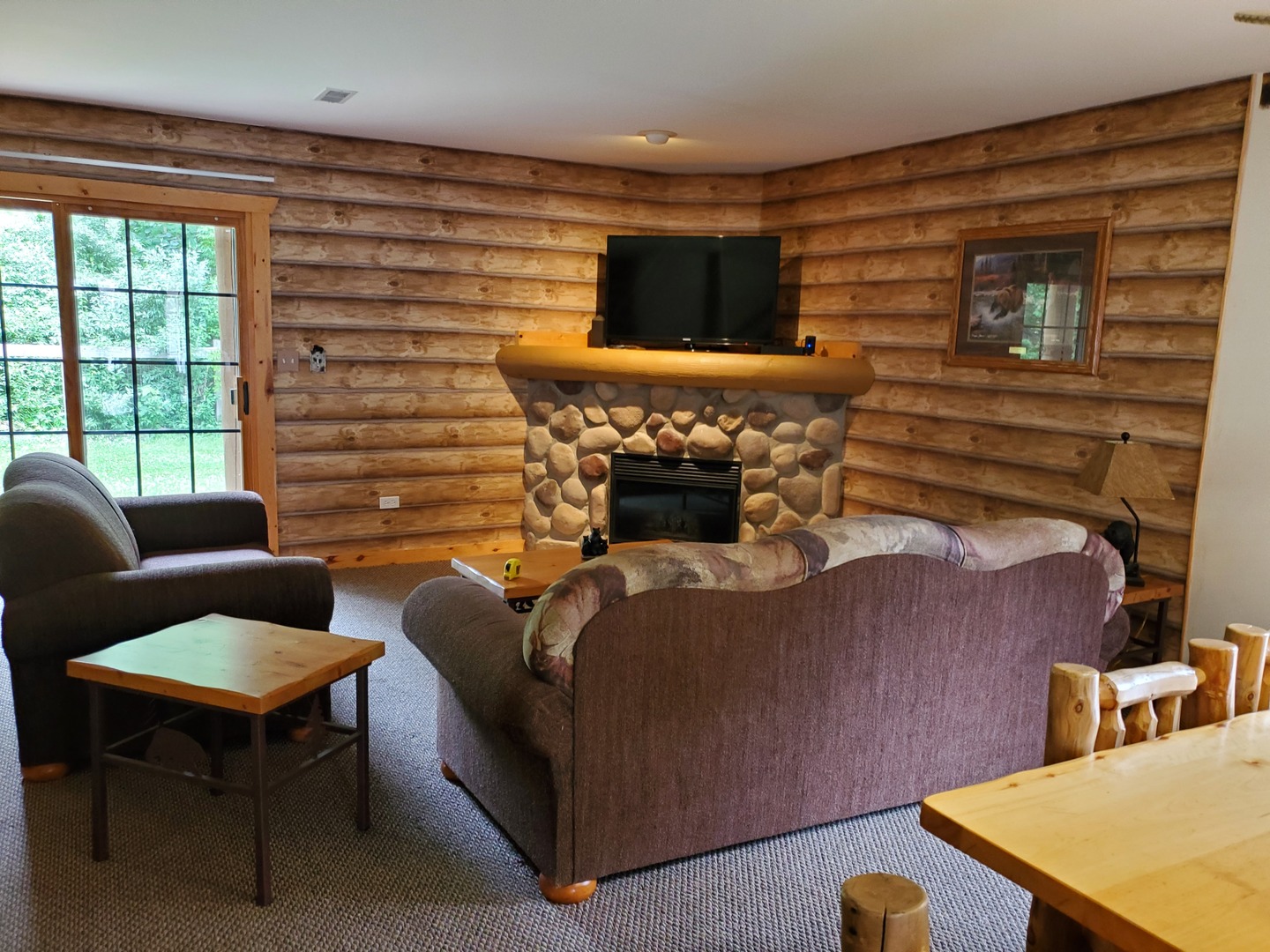 2643 North Illinois Rt 178 Road, Unit I4 Utica, IL 61373 - Photo 6 of 23 a living room with furniture and a fireplace