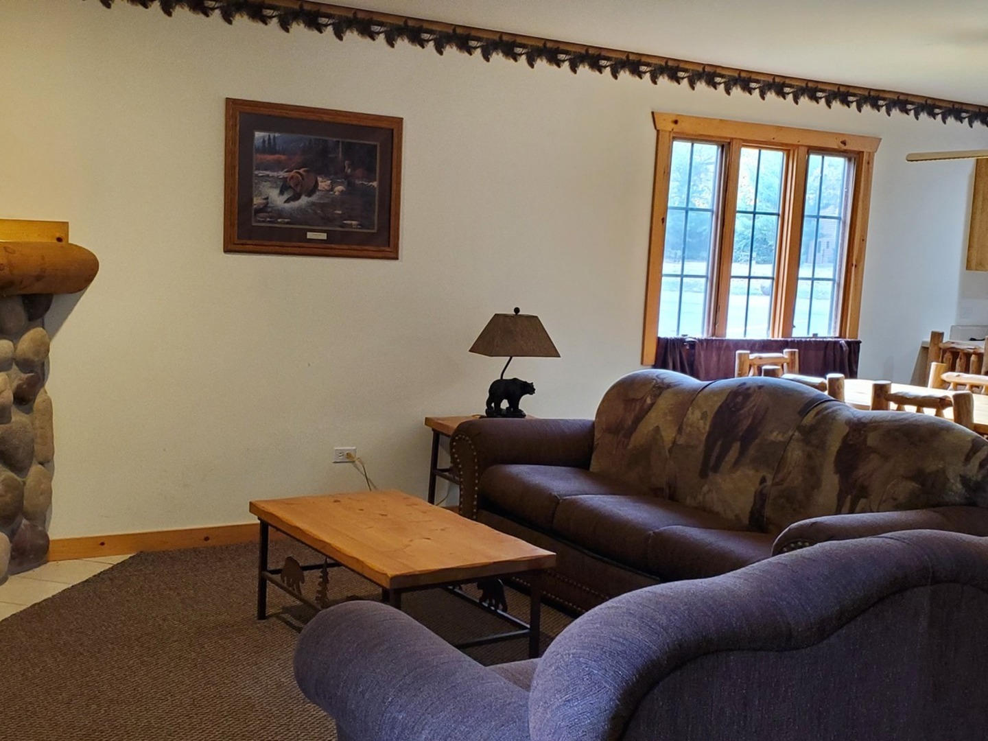 2643 North Illinois Rt 178 Road, Unit I4 Utica, IL 61373 - Photo 9 of 23 a living room with furniture and a window