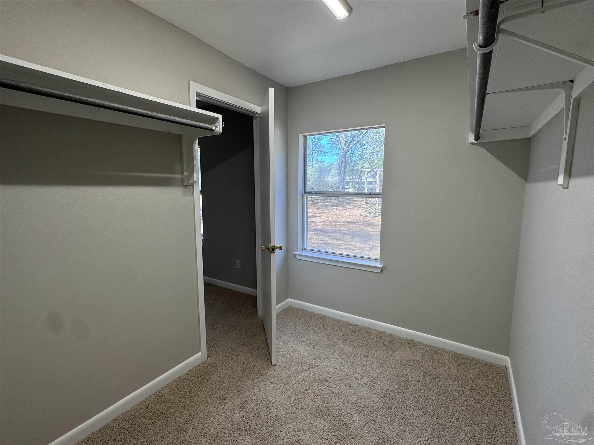 6426 Walnut Street Milton, FL 32570 - Photo 13 of 21 a view of closet