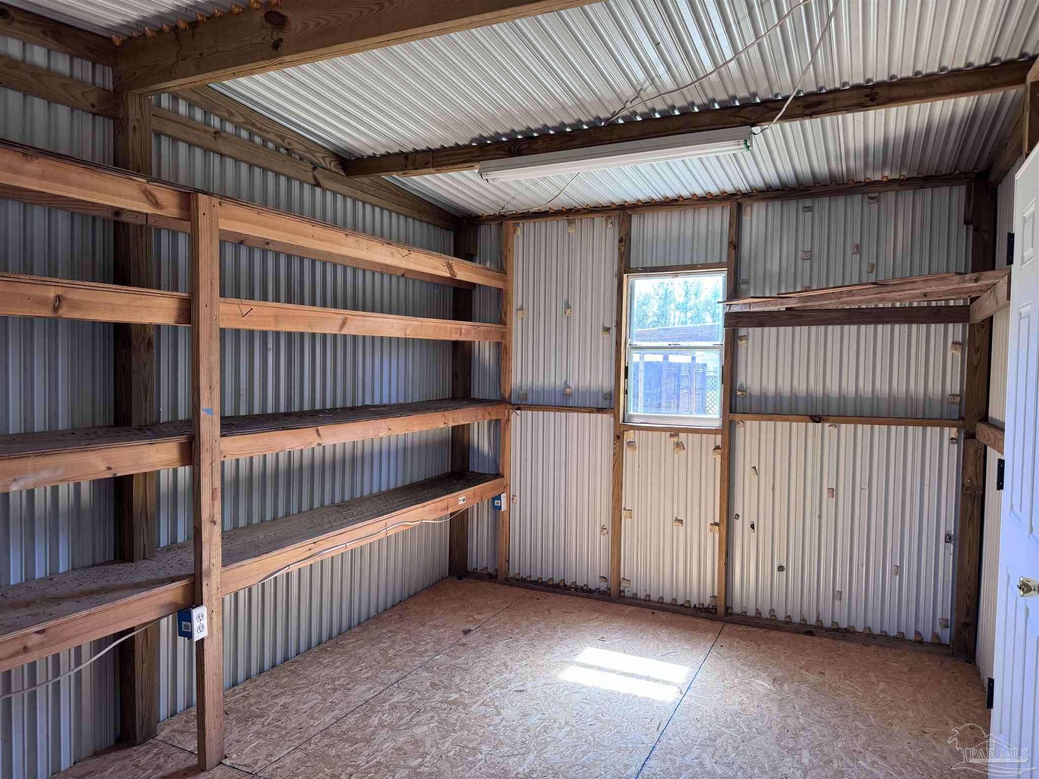 6426 Walnut Street Milton, FL 32570 - Photo 20 of 21 a view of an empty room with furniture